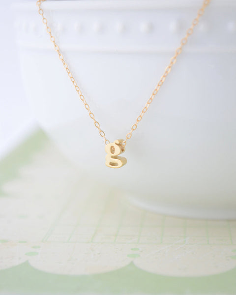 Lowercase gold initial necklace 1001