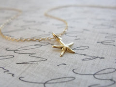 Tiny gold starfish necklace - 1216